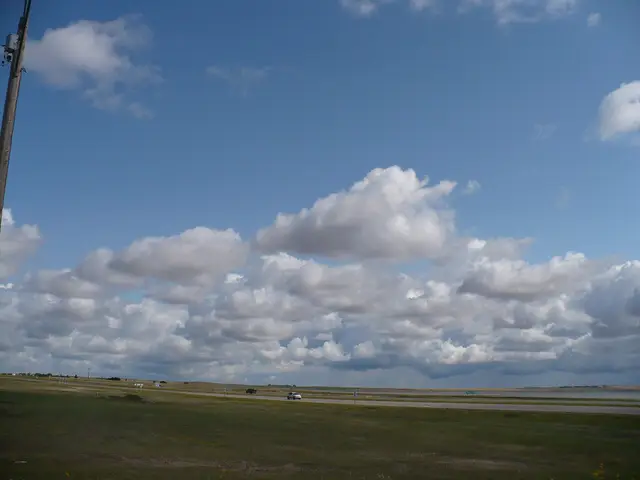 Prairie sky and highway looking south